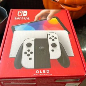 Nintendo switch Oled with Mario game installed